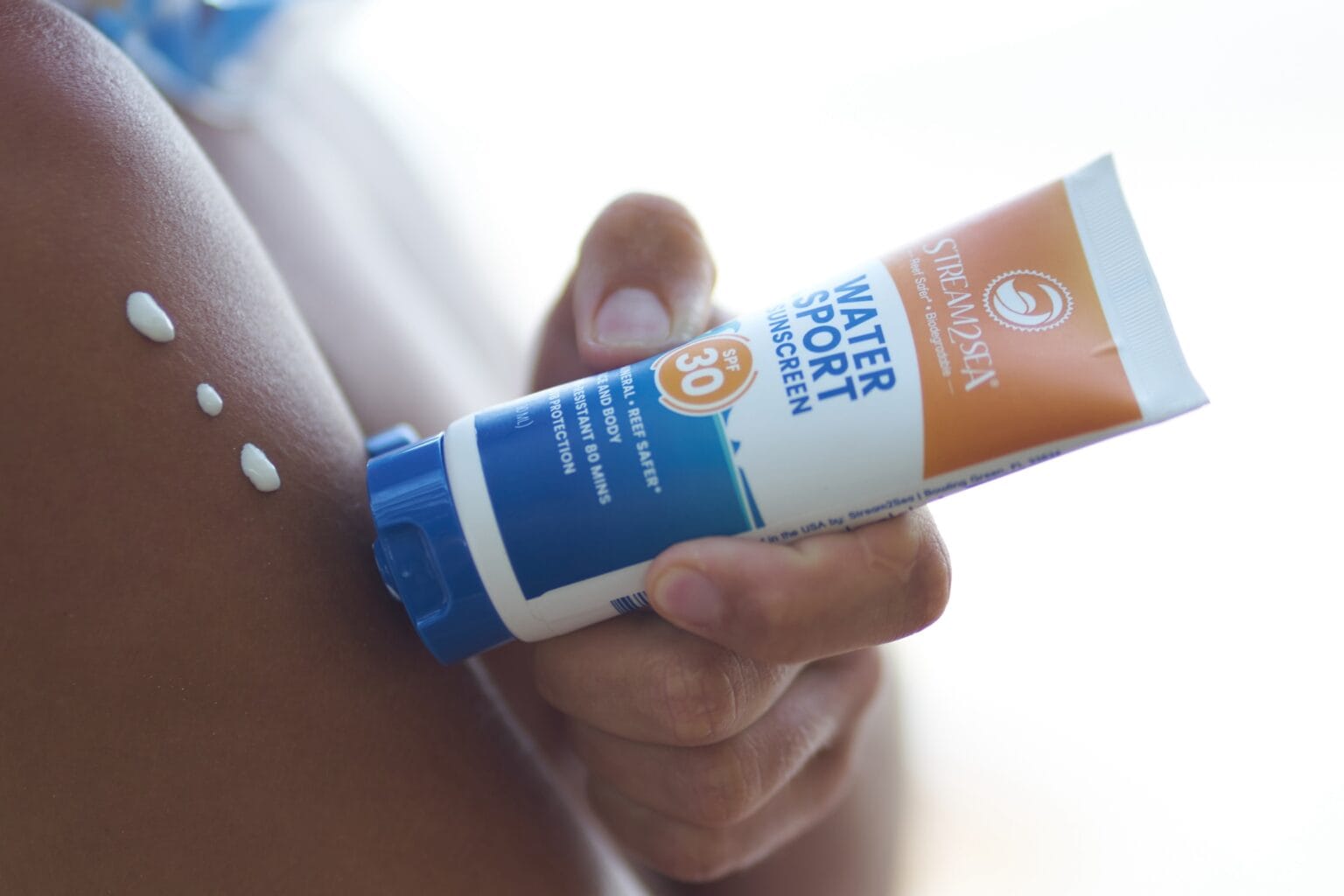 Putting on Stream2Sea Water Sport Sunscreen