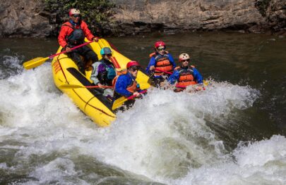 River guides in training drop into a small rapid on the South Fork of the American River.