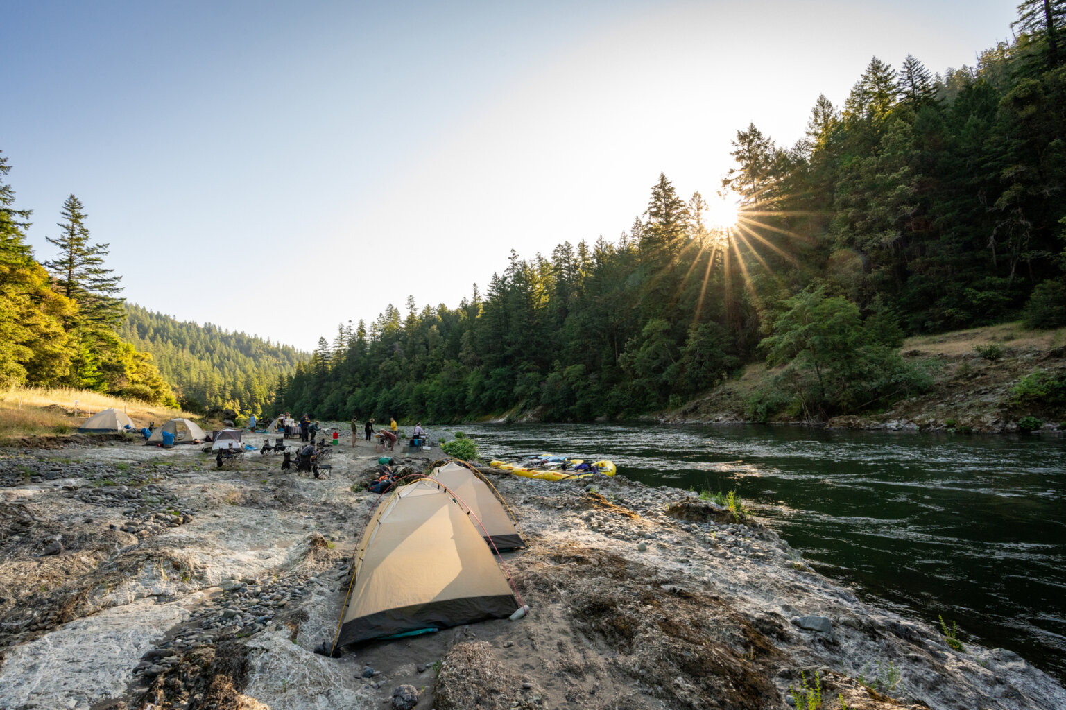 Tents on the Rogue River in Oregon during an OARS rafting trip in June, 2025.
