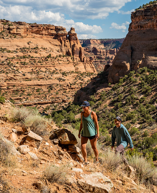 Two young active hikers exploring the backcountry around Westwater Canyon