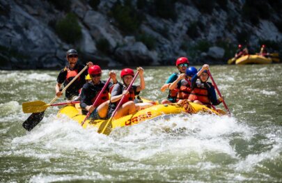 A family rafting on the Green River through Split Mountain Canyon with OARS in 2025.