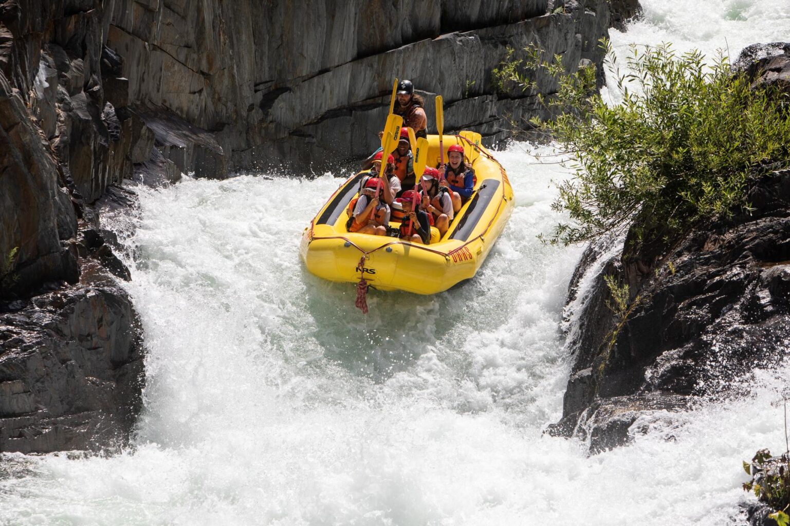A raft drops Tunnel Chute on the Middle Fork on an OARS trip