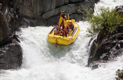 A raft drops Tunnel Chute on the Middle Fork on an OARS trip