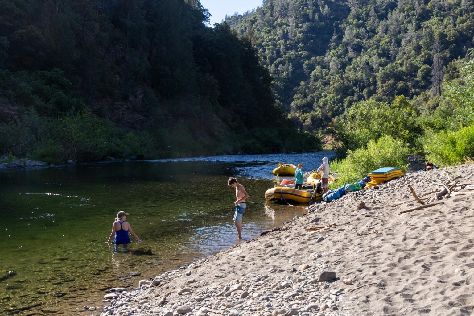 Relaxing at camp during an OARS Two-Day Middle Fork American River trip