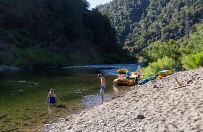 Relaxing at camp during an OARS Two-Day Middle Fork American River trip