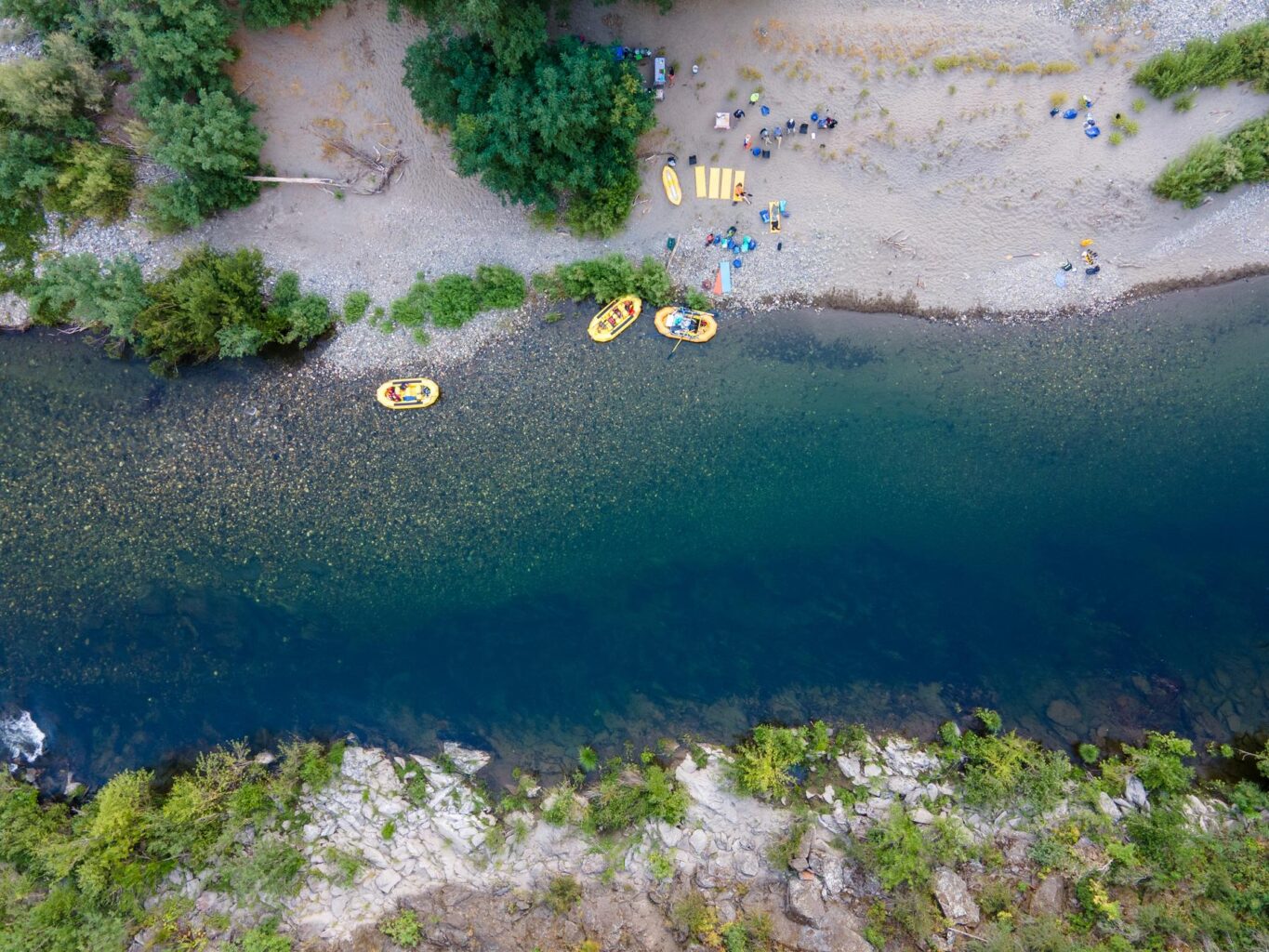 An aerial shot of camping on the Middle Fork American River during an OARS two-day trip