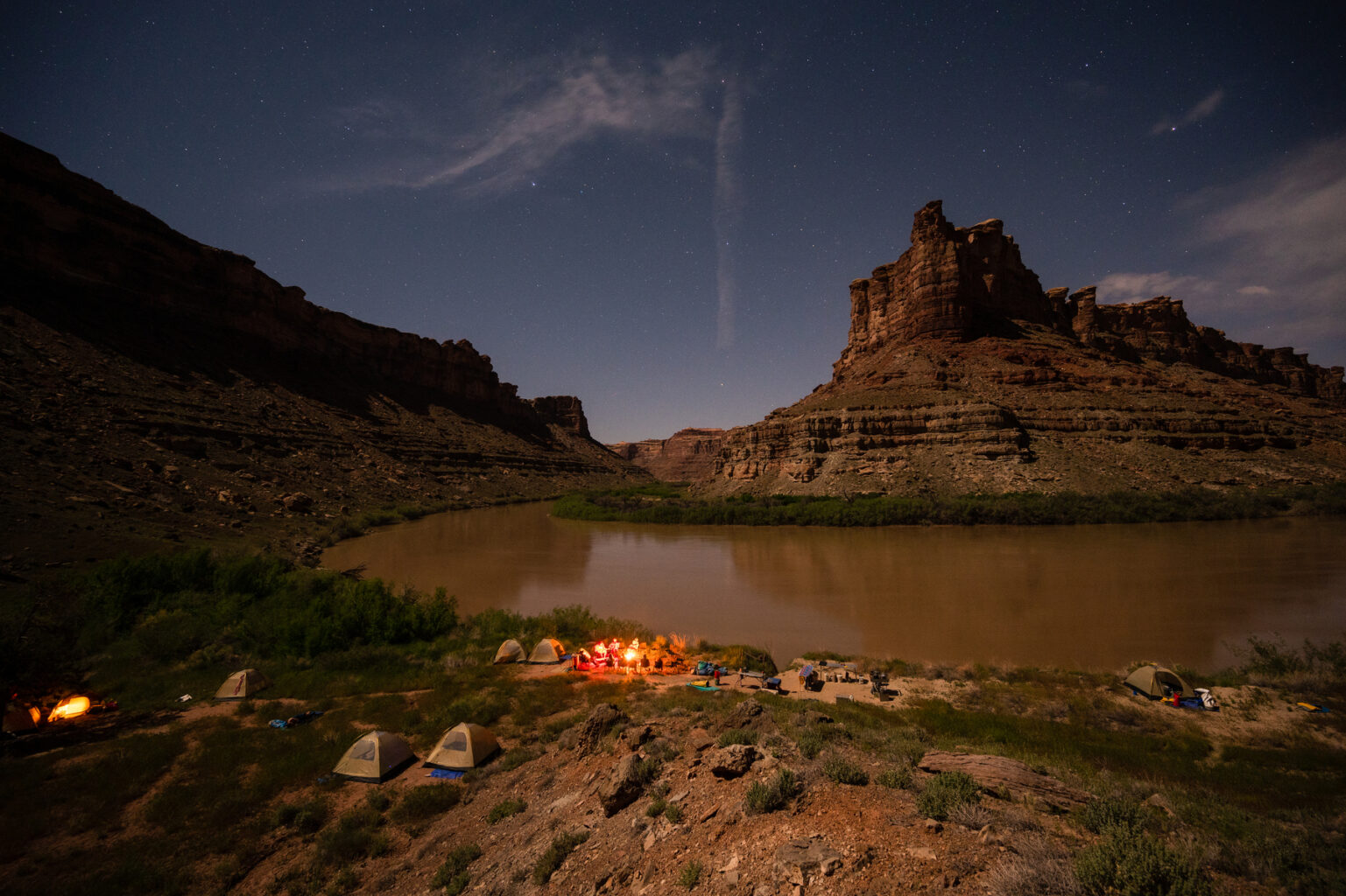 Campsiste along the Colorado River in Cataract Canayon at night