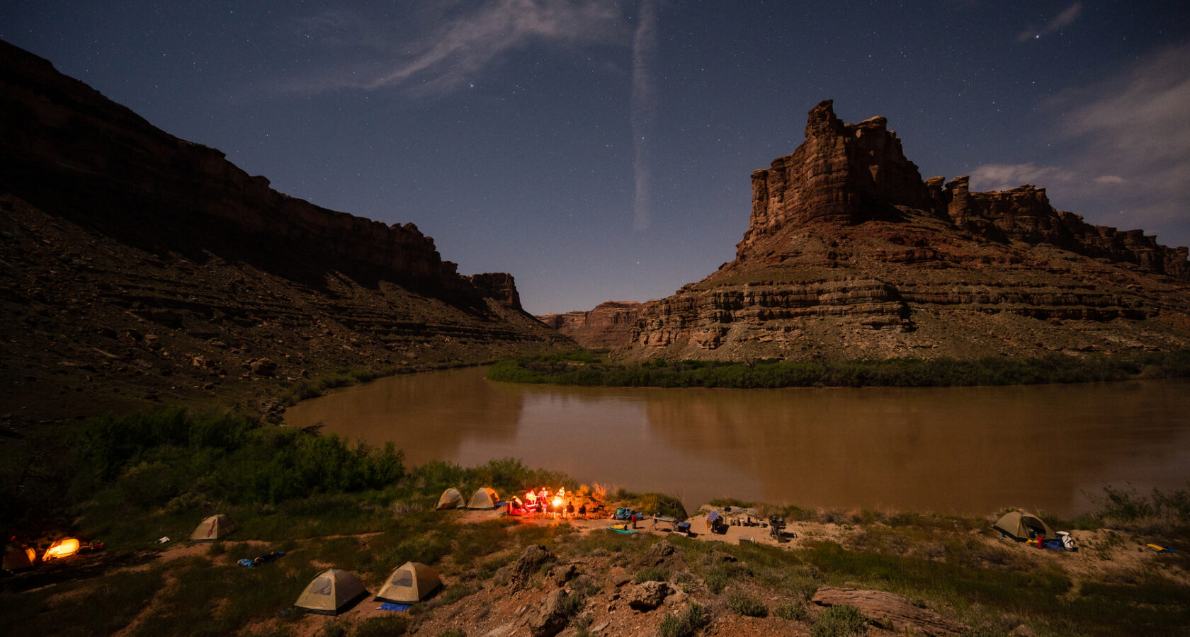Campsiste along the Colorado River in Cataract Canayon at night