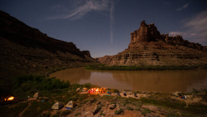 Campsiste along the Colorado River in Cataract Canayon at night