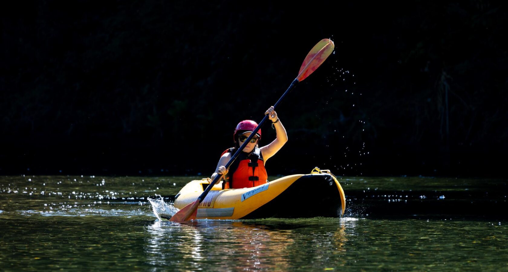 A guests on an OARS trip tried inflatable kayaking on the Middle Fork of the American River