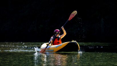 A guests on an OARS trip tried inflatable kayaking on the Middle Fork of the American River