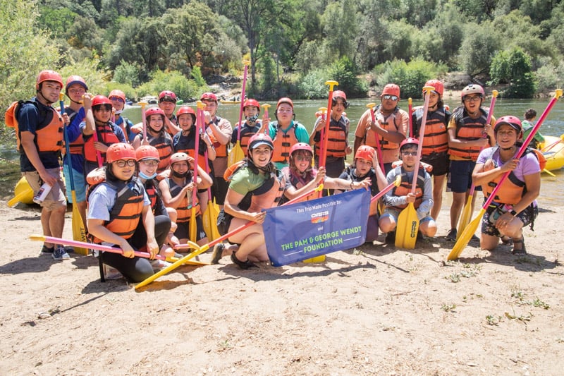 KIPP Navigate group poses for a photo near the South Fork of the American River