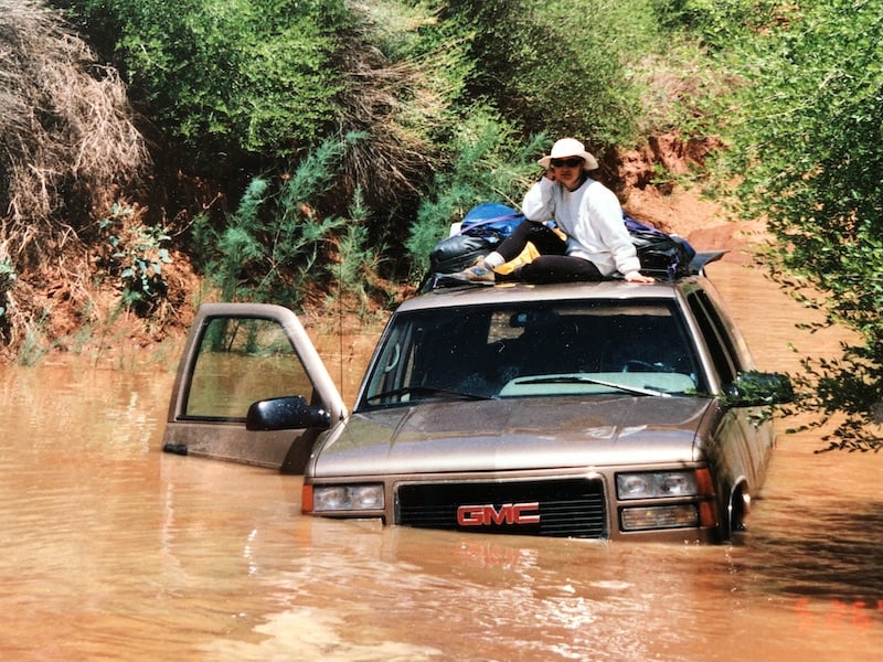 Sitting on top of a flooded SUV