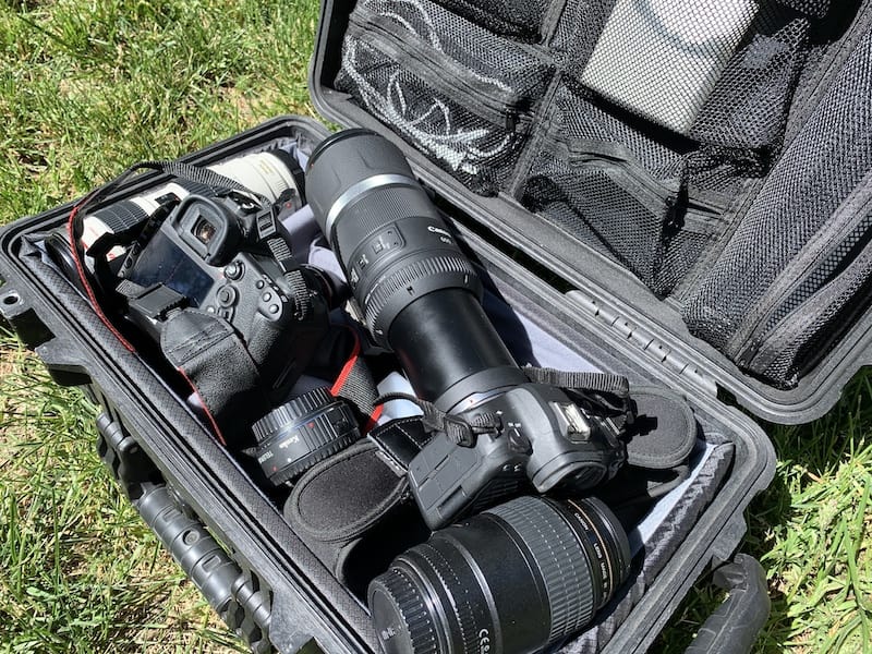 A case full of cameras and lenses