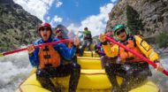 A group of people rafting.