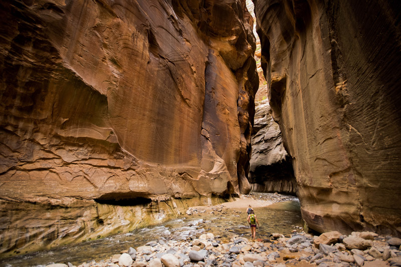 Two hikers in Zion National Park's Narrows