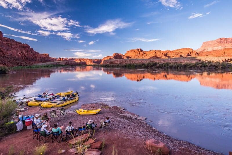 Sunset in Cataract Canyon with rafts in the foreground