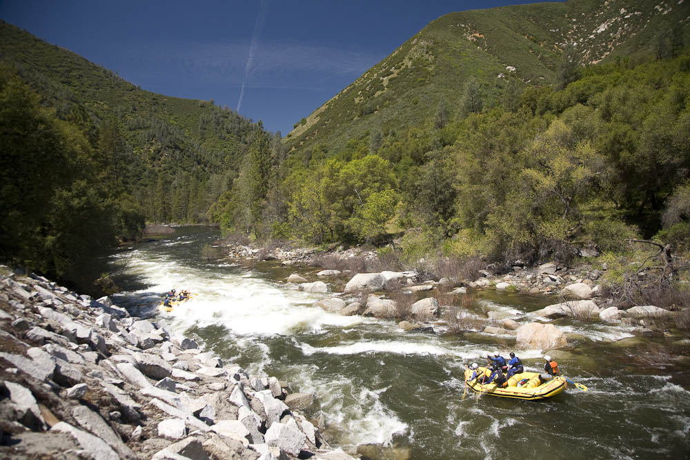 Whitewater rafting on the Merced River which flows out of Yosemite national Park, CA.