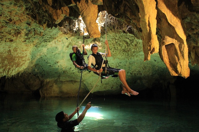 rappeling in a cenote