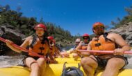 Smiling woman on a yellow raft