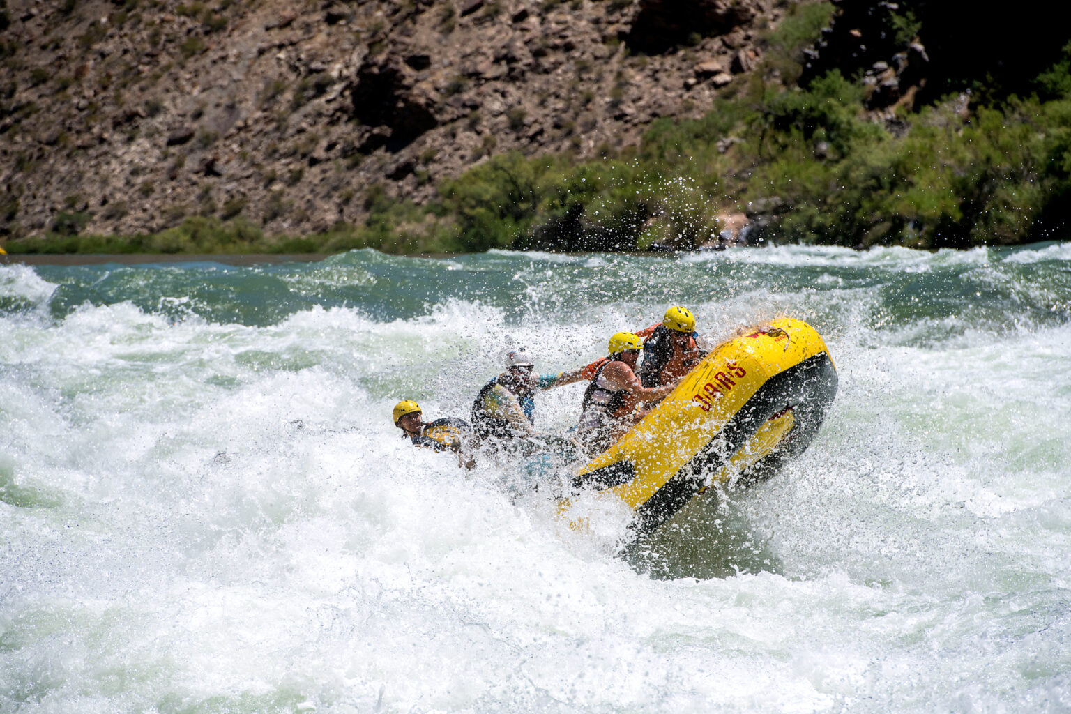 Guests hang on as OARS raft runs Lava Falls in Grand Canyon