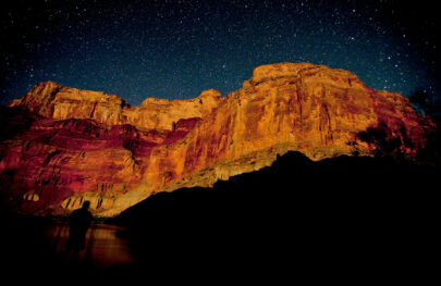 Sunset and stars on cliffs in Grand Canyon