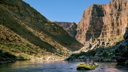Yellow OARS rafts in lower section of Grand Canyon