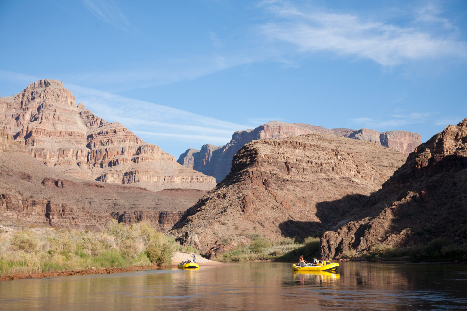 Two OARS rafts in calm water in lower section of Grand Canyon