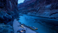 OARS rafts and dories stop to camp for the night deep in Grand Canyon