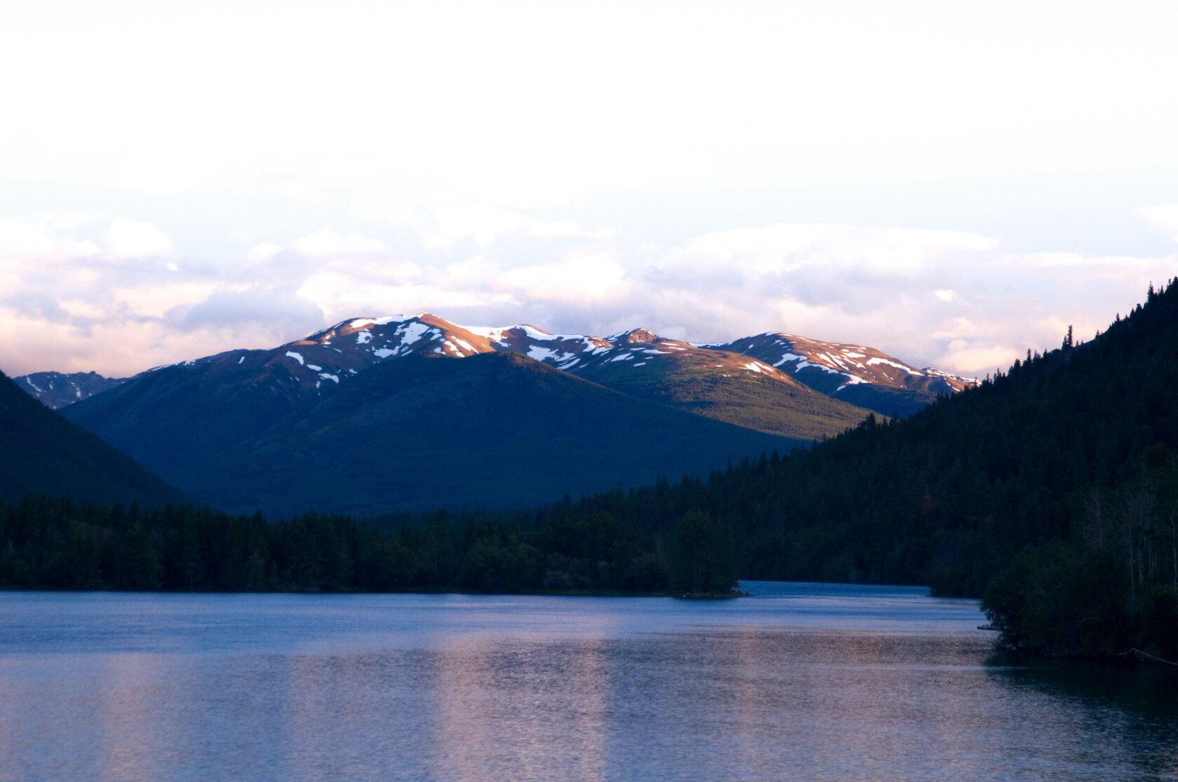 Canadian lake with mountains in the background.