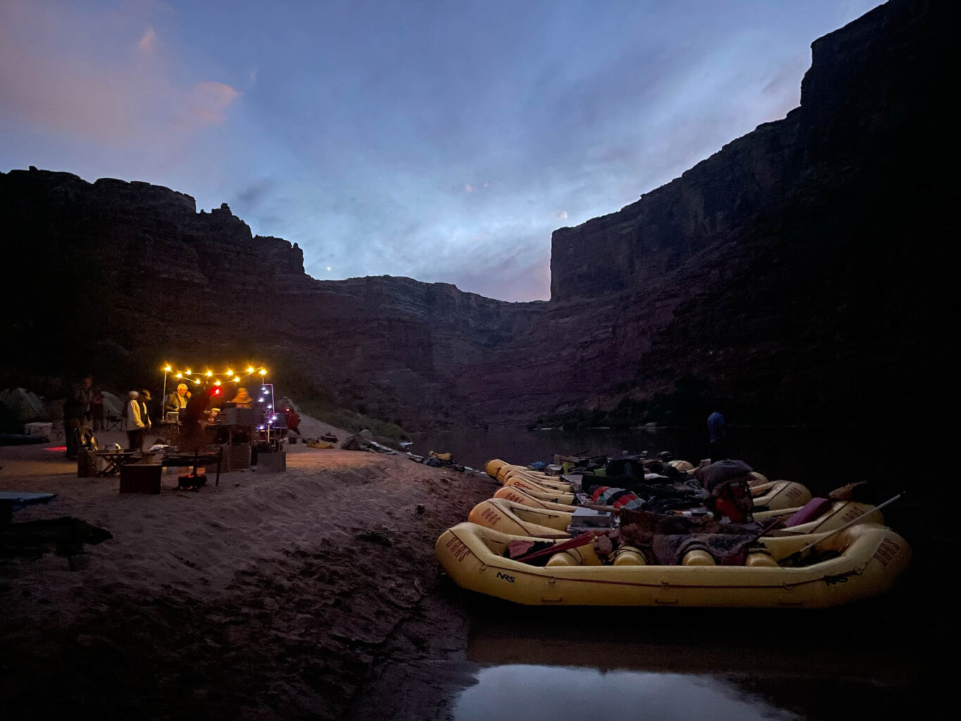 Rafting group camp set up at night in Canyonlands National Park.