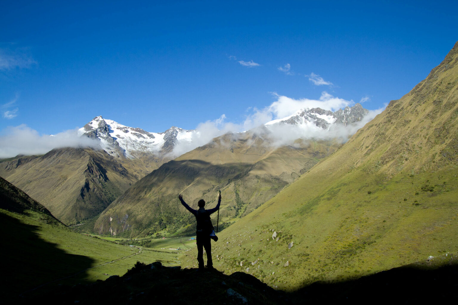 Person hiking in the mountains of Peru.