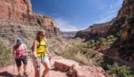 Two women hiking up the Bright Angel Trail in Grand Canyon National Park.