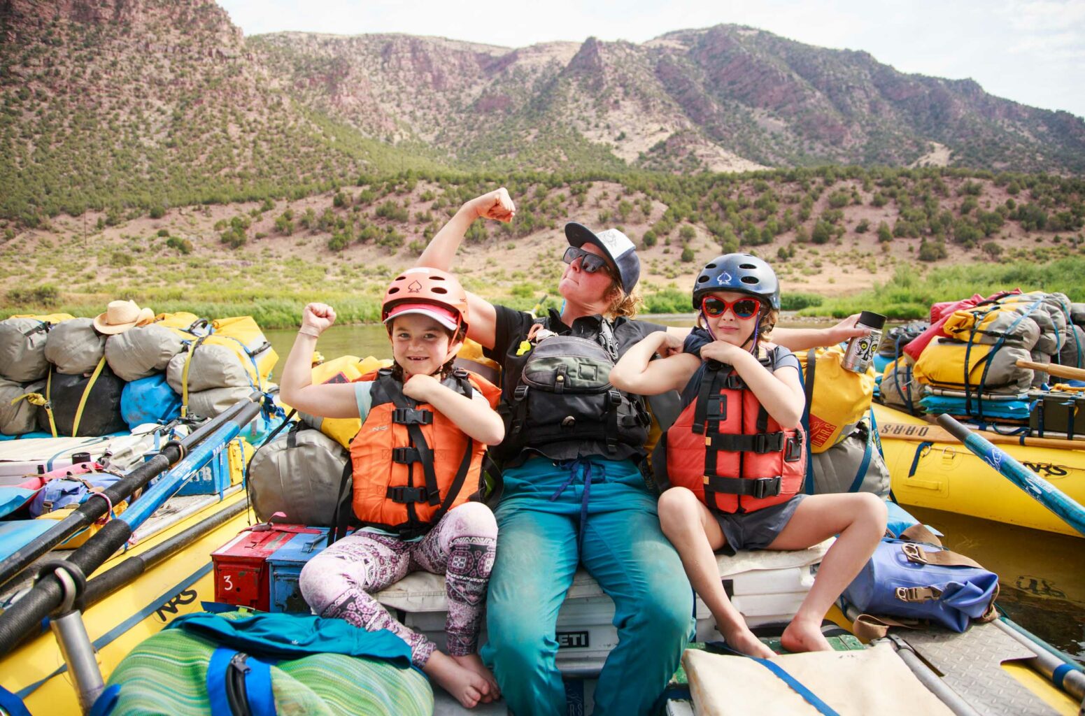 A family on a raft in Flaming Gorge.
