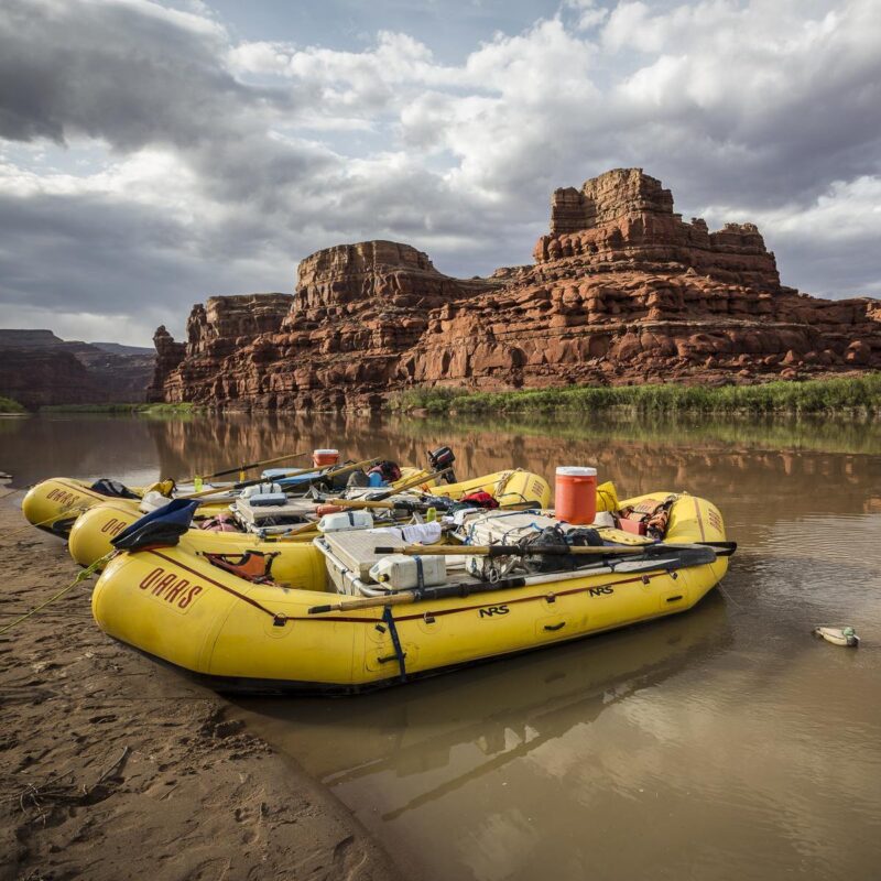 OARS rafts during a stop along the Colorado River through Cataract Canyon.