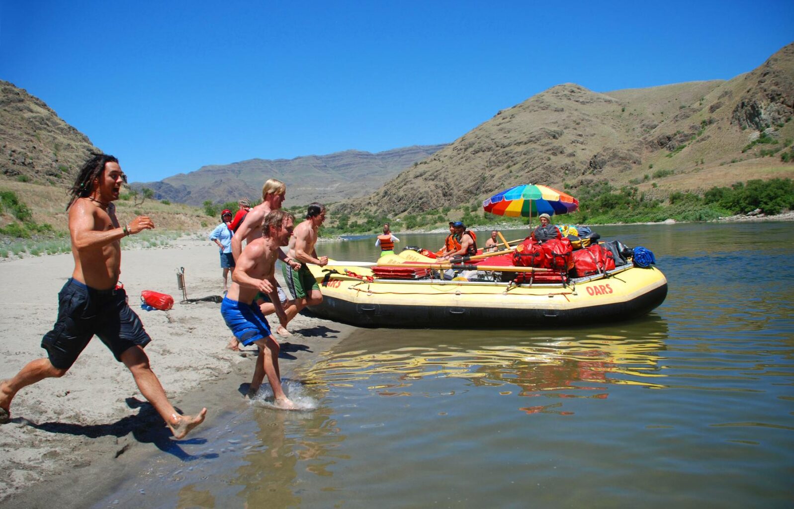 Adults on the Snake River through Hells Canyon.