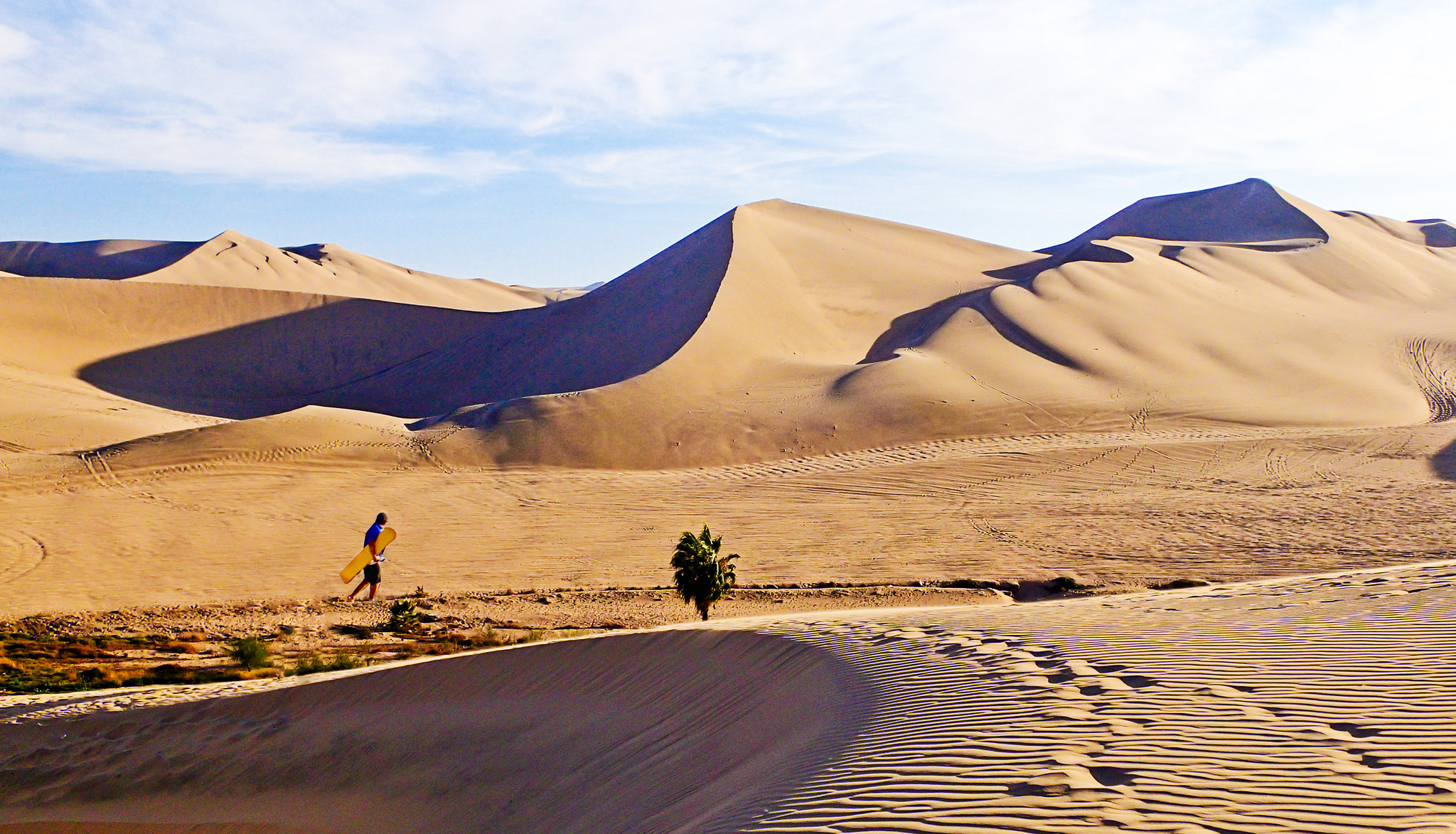 10 Must-Do Peru Adventures That Aren’t Machu Picchu | Sandboard massive sand dunes in Huacachina | Photo: Justin Vidamo / WikiCommons