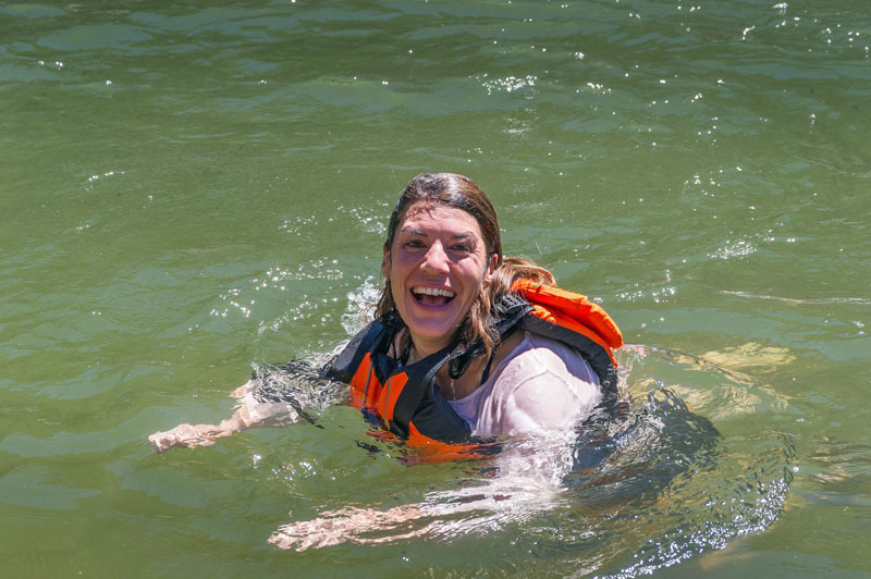 A woman swim in the clear waters of Idaho's Salmon River