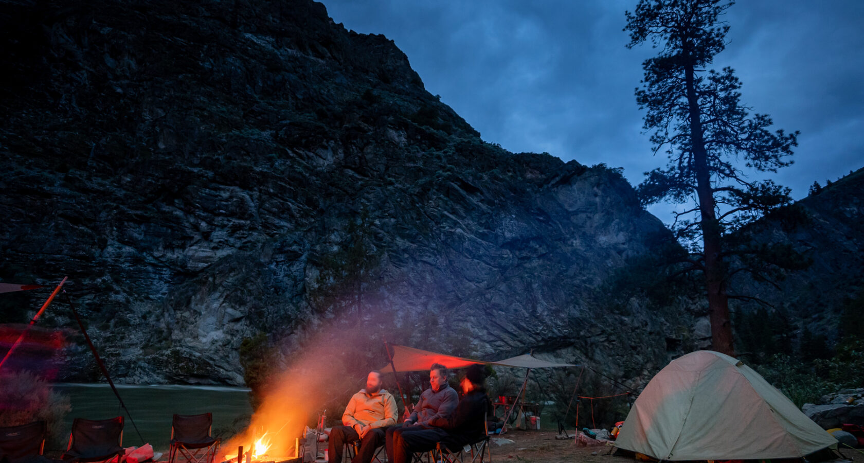 Enjoying the campfire on a beach near Idaho's Middle Fork of the Salmon River.