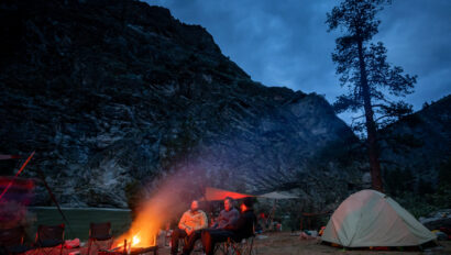 Enjoying the campfire on a beach near Idaho's Middle Fork of the Salmon River.