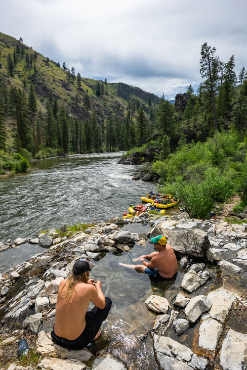 Riverside hot spring being enjoyed by guests on a Middle Fork Salmon rafting trip
