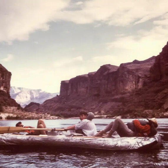 Bruce Helin rowing a boat.