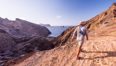 Man hiking on San Cristobal in the Galapagos Islands