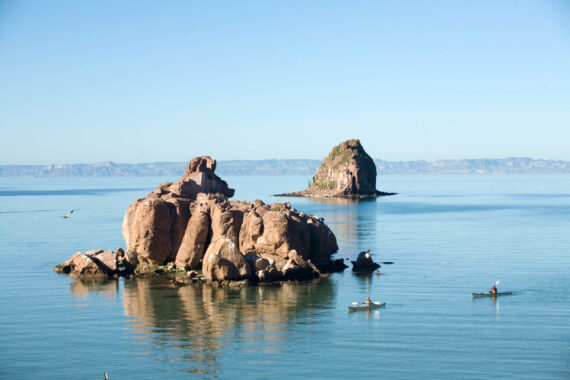 Young women kayaking on the Sea of Cortez, Mexico.