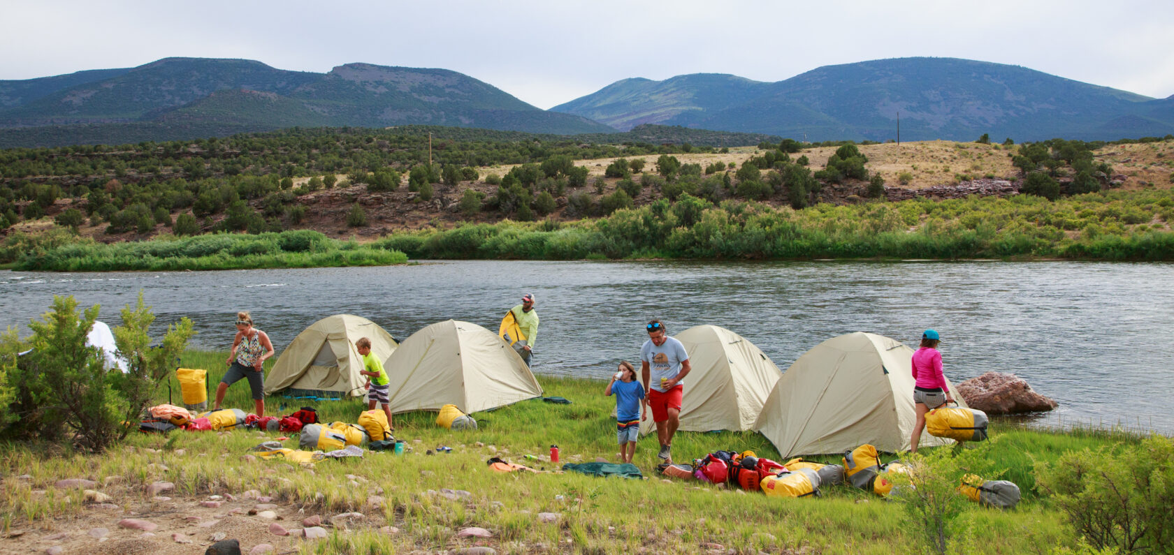 Setting a camp on a Flaming Gorge trip with OARS in Utah.