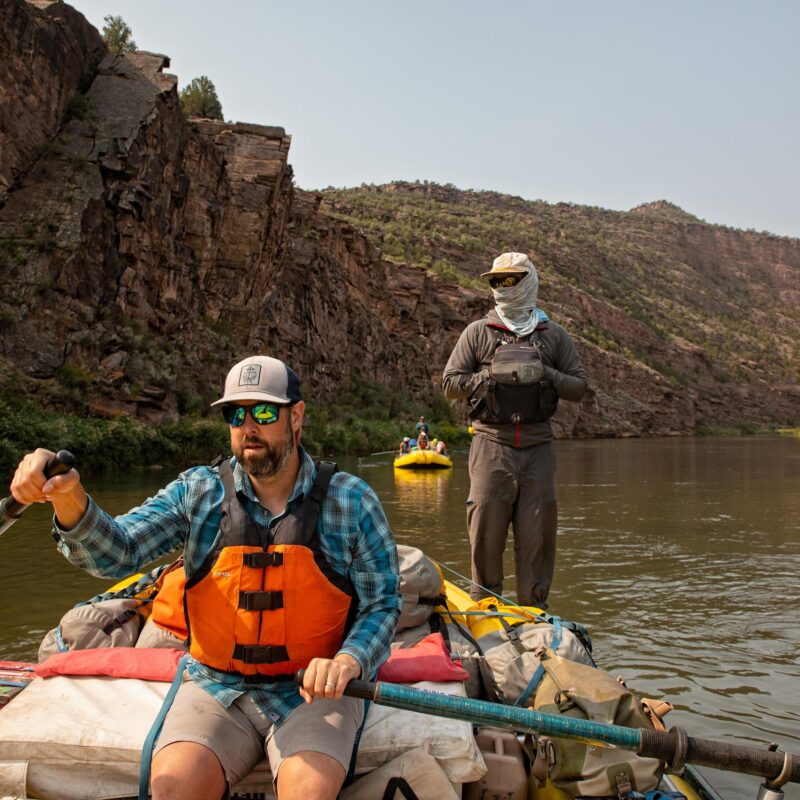 A participant in an OARS Green River Rowing Clinic works on rowing