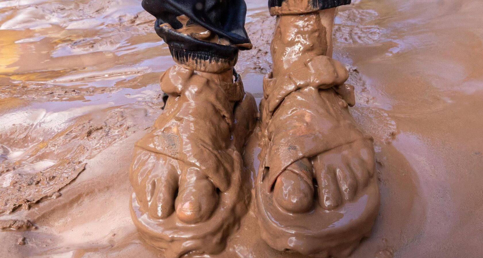 Muddy feet near the Colorado River in Grand Canyon