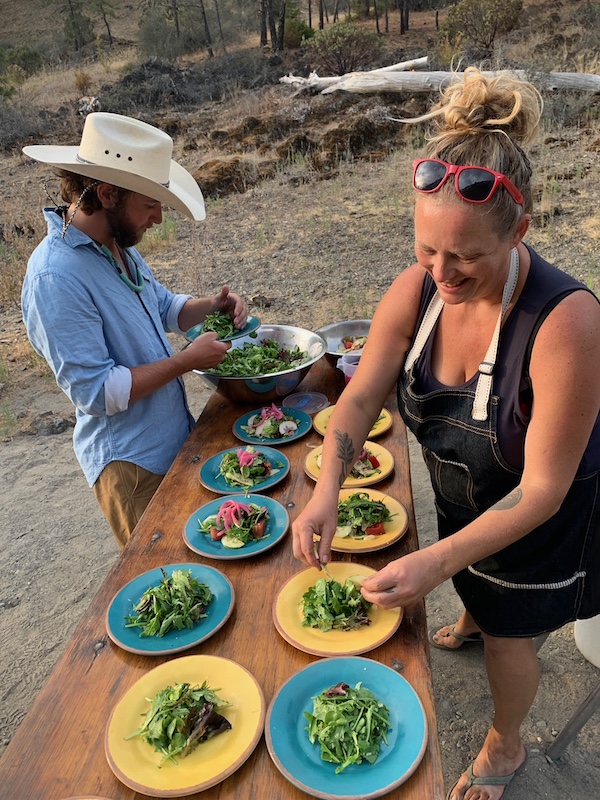 Carrie Catterall plates food on an OARS wilderness gourmet trip