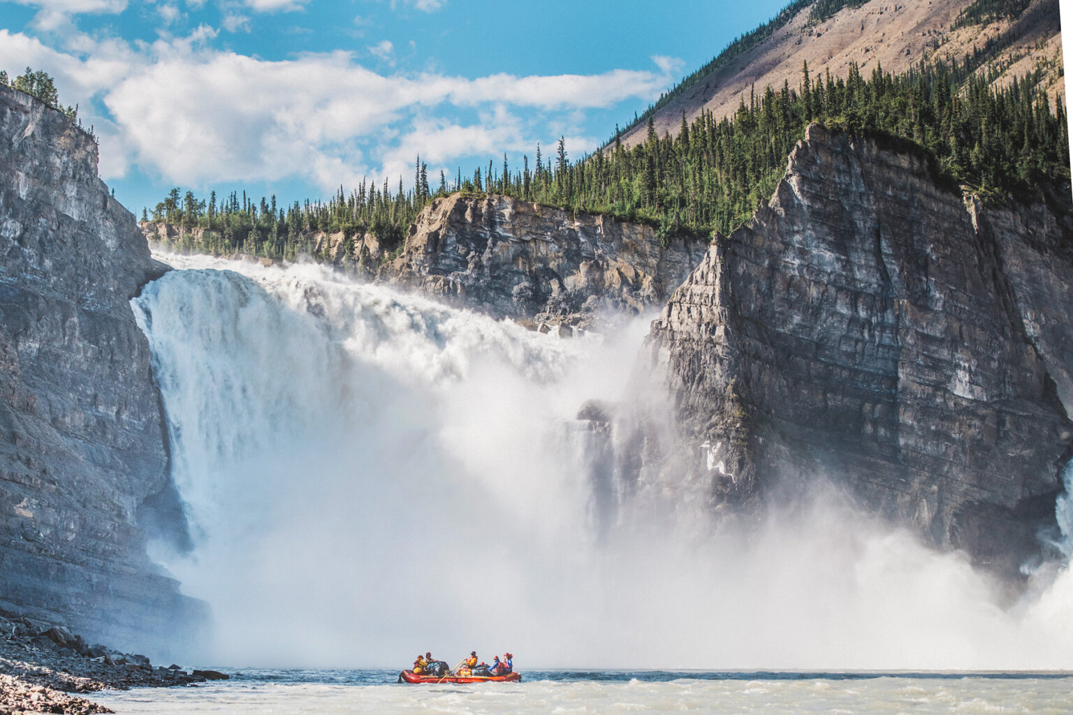 Nahanni River rafting trips begin at the base of spectacular Virginia Falls