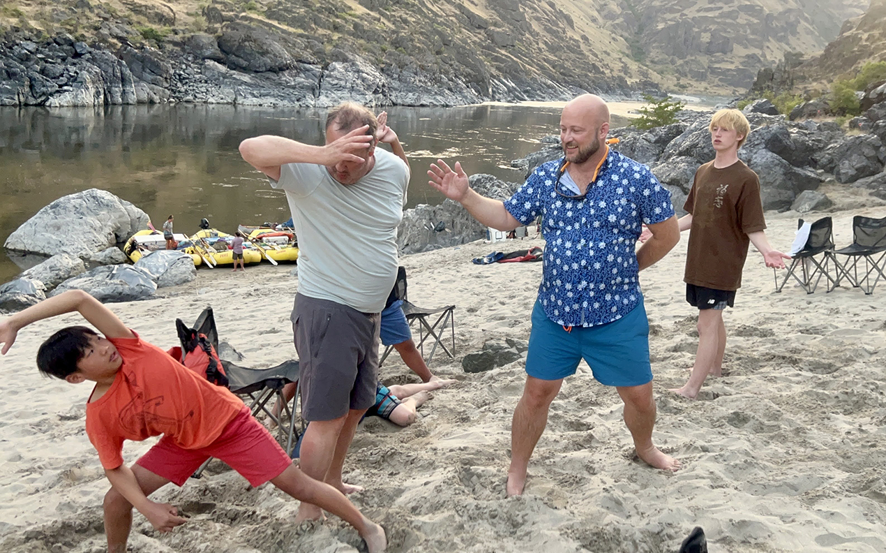 OARS Snake River rafting guests playing a game of "Ninja" at camp | Photo: Grace Yu